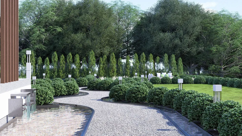 Gravel path with water rill and shrubs